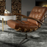 Dark brown leather and walnut swivel armchair