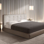 Brown fabric and brown eco-leather upholstered bed