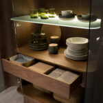 Tall sideboard in tempered glass, walnut with interior lighting