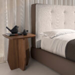 Brown fabric and brown eco-leather upholstered bed